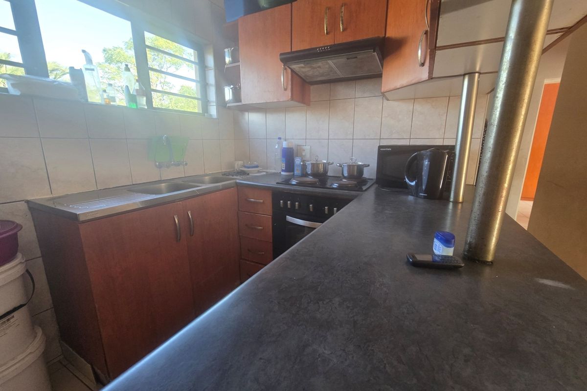 FIXER UPPER DUET IN BIRDSWOOD - Photo 4