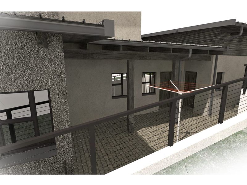 A covered patio area featuring tiled flooring, timber structural beams, and a metal railing overlooking the exterior space.