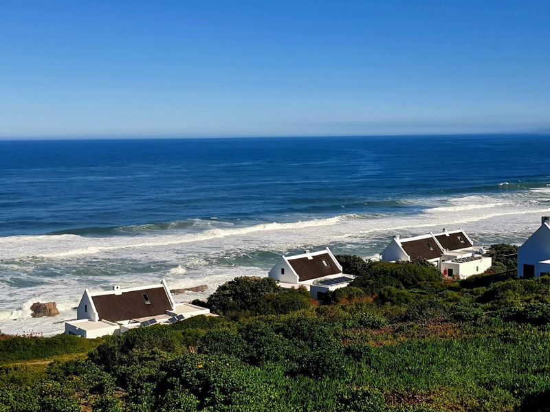 A Sea Front Home in Private Coastal Estate - Photo 2