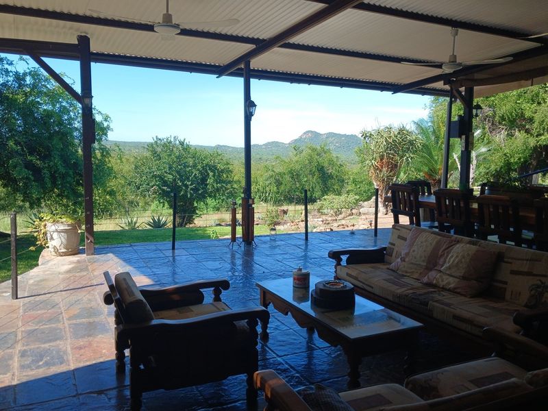 Situated in a stunning location, this Farmhouse with a Cottage in Grietjie private nature reserve - Photo 5