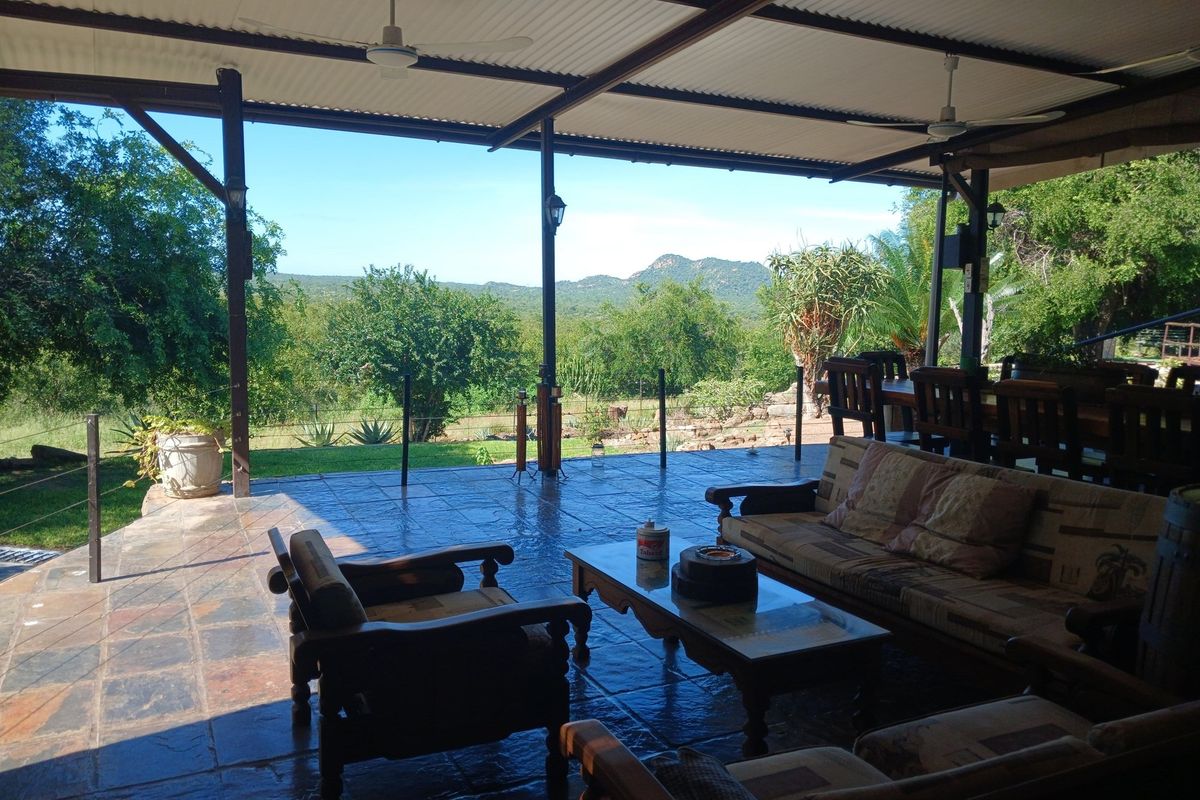 Situated in a stunning location, this Farmhouse with a Cottage in Grietjie private nature reserve - Photo 5