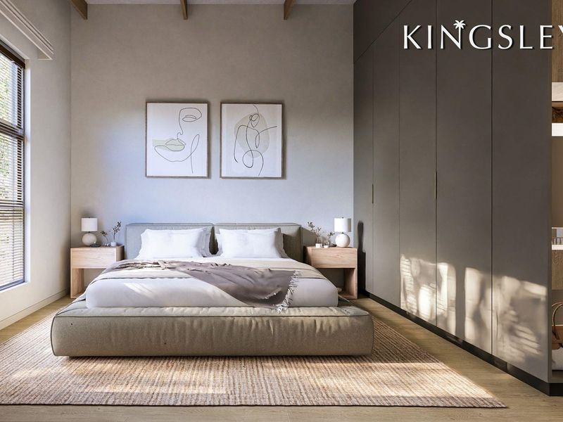 Modern bedroom featuring floor-to-ceiling built-in cupboards, exposed timber ceiling beams, and light timber flooring with natural light.