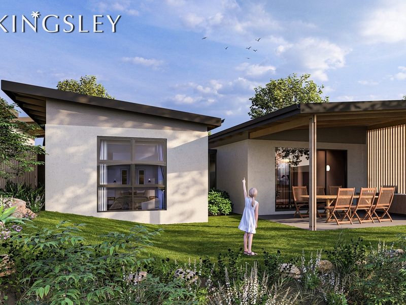 A modern rear exterior view featuring a covered patio area, landscaped garden, and contemporary architectural design with large glass sliding doors.