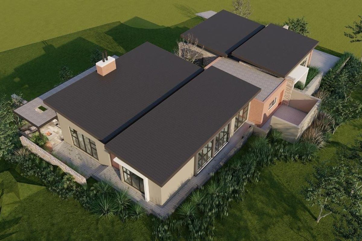 An aerial view of a modern residential property design featuring a flat roof, stone accents, and integrated outdoor patio space.