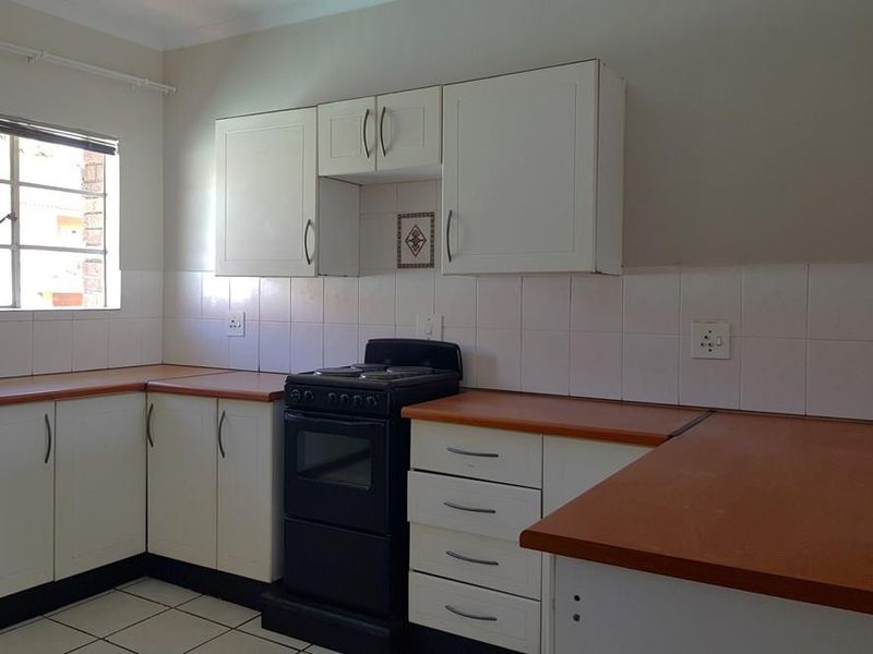 Charming 2-Bedroom Sectional Title Property with Scenic Balcony Views - Photo 9