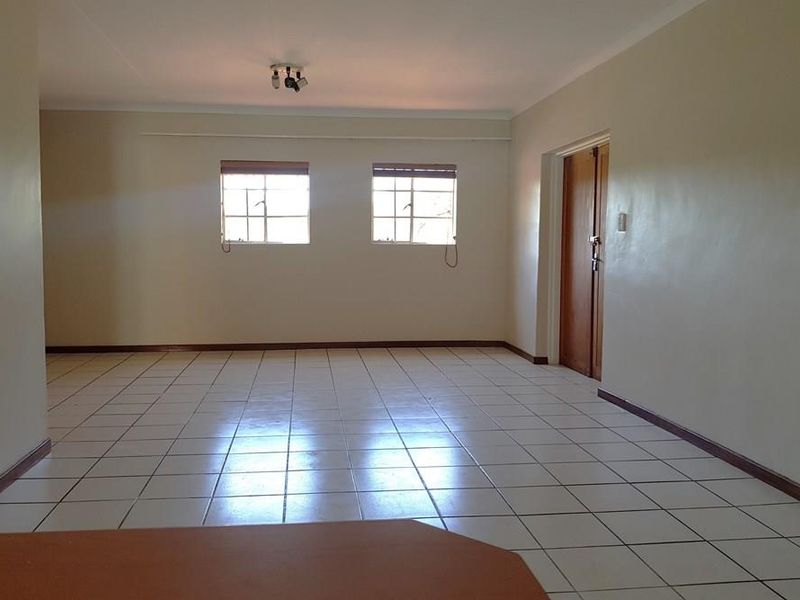 Charming 2-Bedroom Sectional Title Property with Scenic Balcony Views - Photo 6