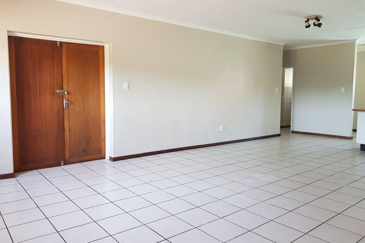 Charming 2-Bedroom Sectional Title Property with Scenic Balcony Views - Photo 4