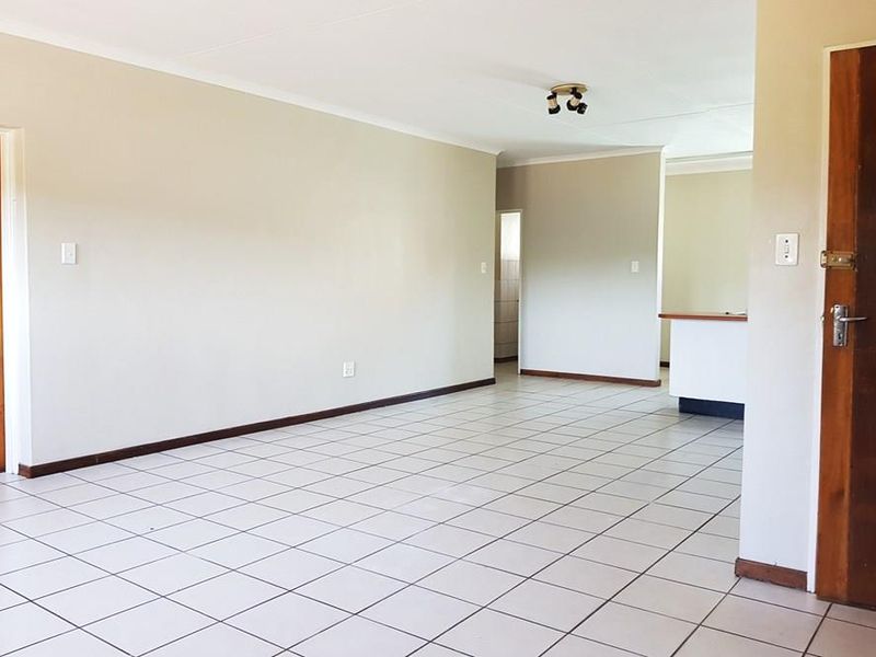 Charming 2-Bedroom Sectional Title Property with Scenic Balcony Views - Photo 3