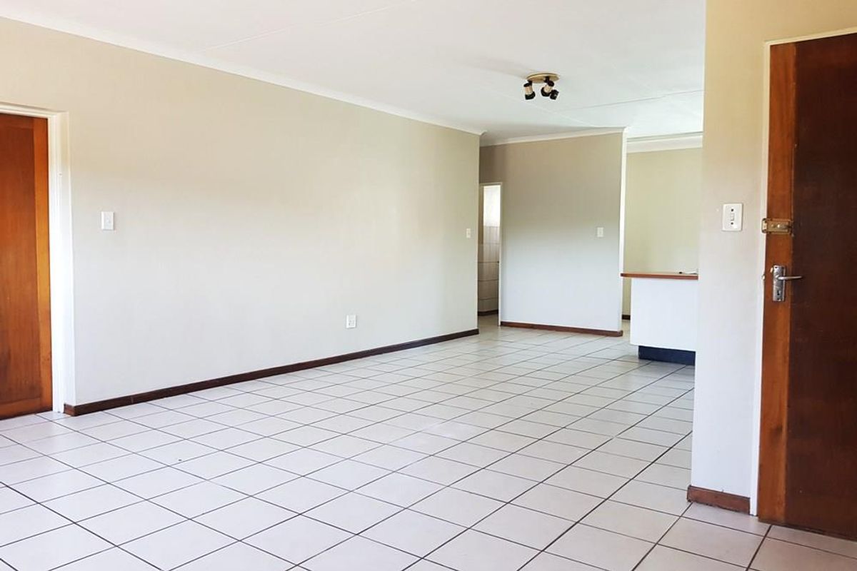 Charming 2-Bedroom Sectional Title Property with Scenic Balcony Views - Photo 3