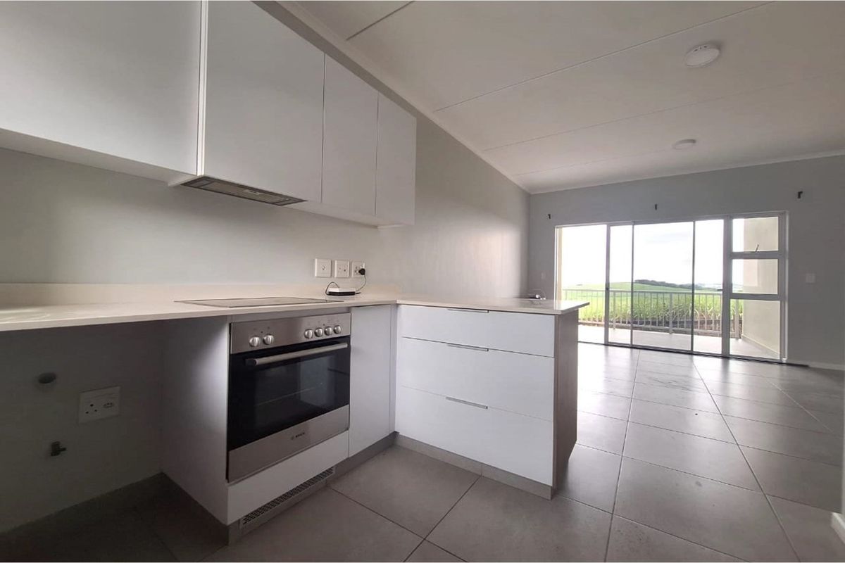 Modern 3-Bedroom Apartment with Serene Views - Photo 3