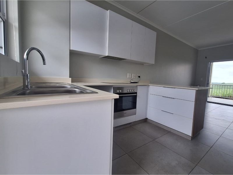 Modern 3-Bedroom Apartment with Serene Views - Photo 2