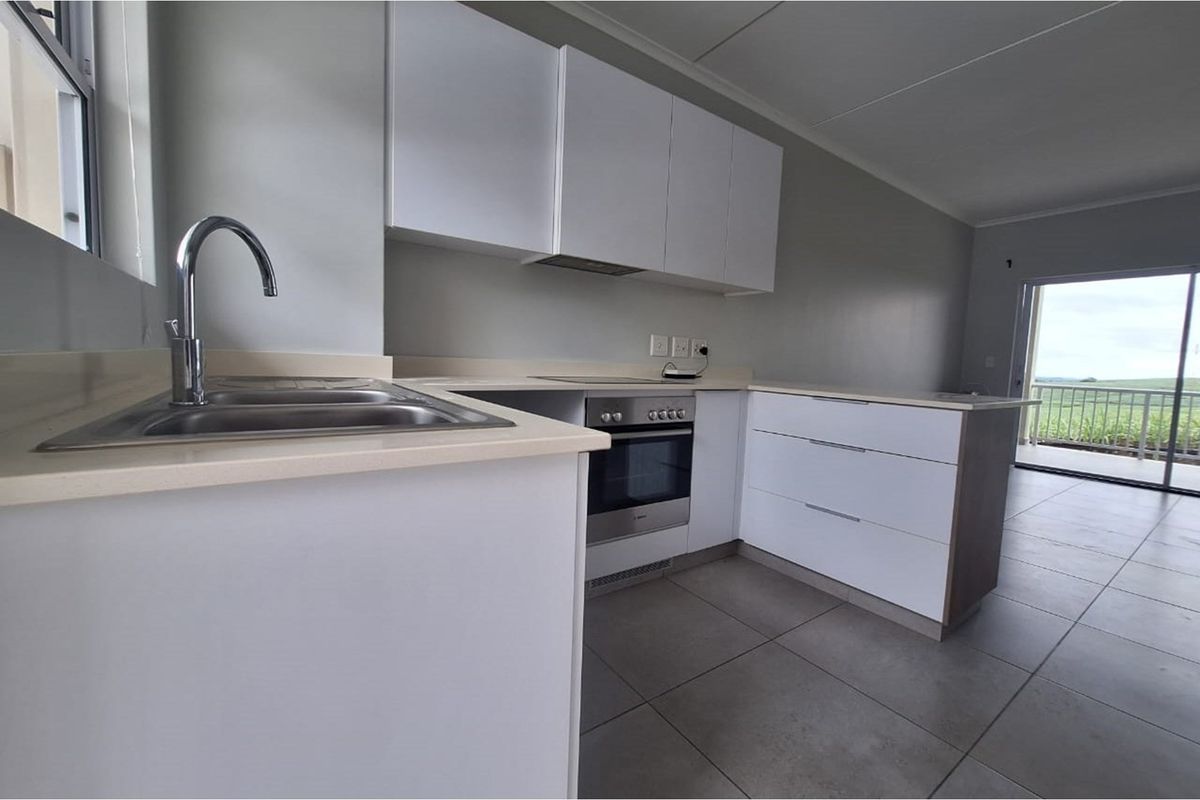 Modern 3-Bedroom Apartment with Serene Views - Photo 2