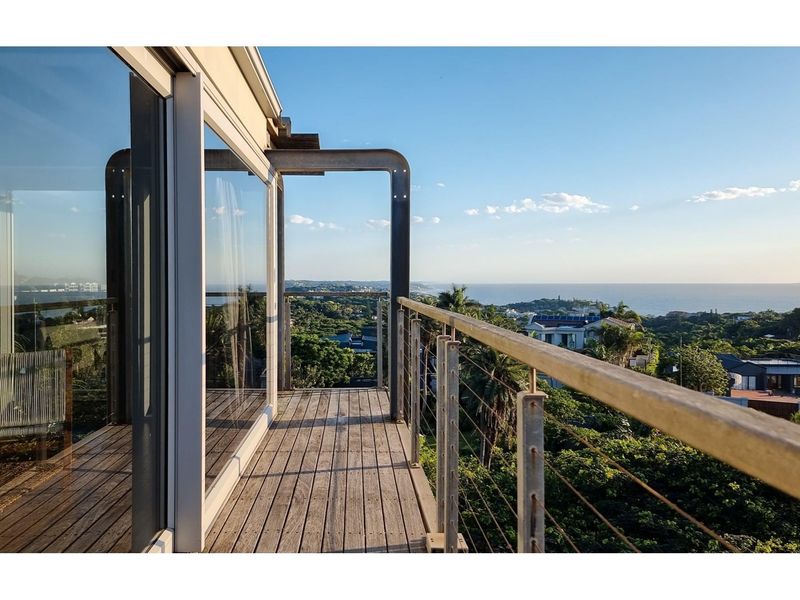 Luxurious Eco-Friendly Residence with Panoramic Ocean and Inland Views - Photo 9