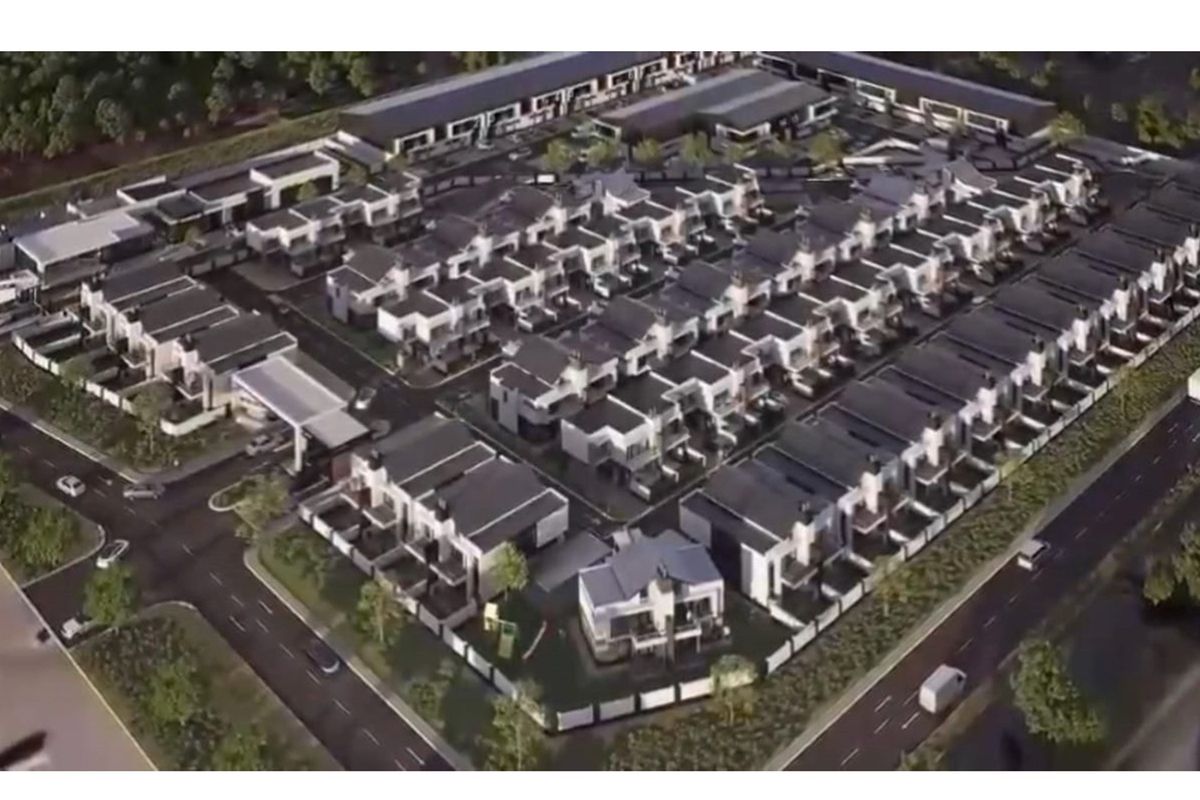 An aerial view of a modern residential apartment complex development, showcasing the layout of multiple units, internal roads, and surrounding infrastructure.