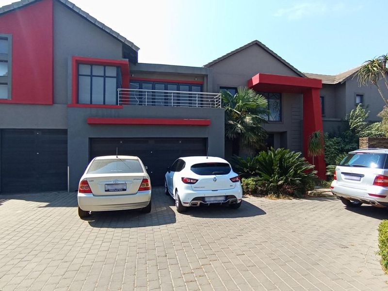 magnificent 6-bedroom, 5-bathroom home situated in the prestigious Midstream Estate - Photo 2