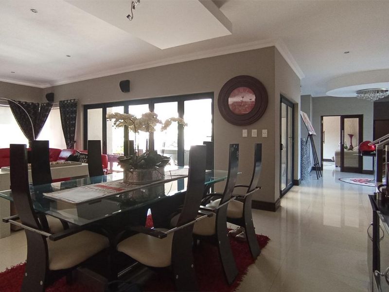 magnificent 6-bedroom, 5-bathroom home situated in the prestigious Midstream Estate - Photo 9