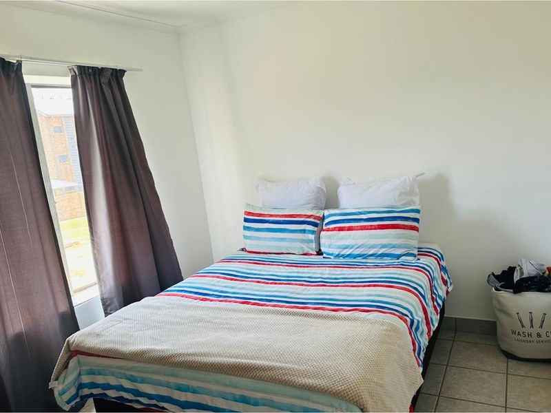 Contemporary 2-Bed Apartment in Sagewood - Photo 6