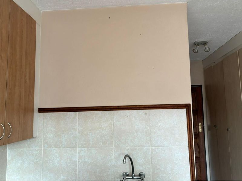 Charming Bachelor Unit with Carport in Crescent Glades Estate - Photo 8