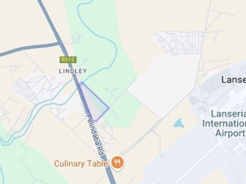 A map view showing the location of the vacant land parcel near the R512 road and Lanseria International Airport.