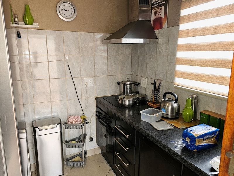 Cozy 2-Bedroom Family Home in Vibrant Community with Expansion Potential - Photo 9