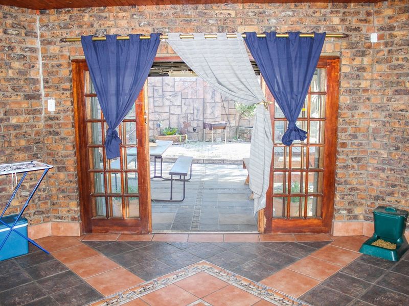 Move-In Ready Family Gem with Pool, Security & Space Galore! - Photo 9