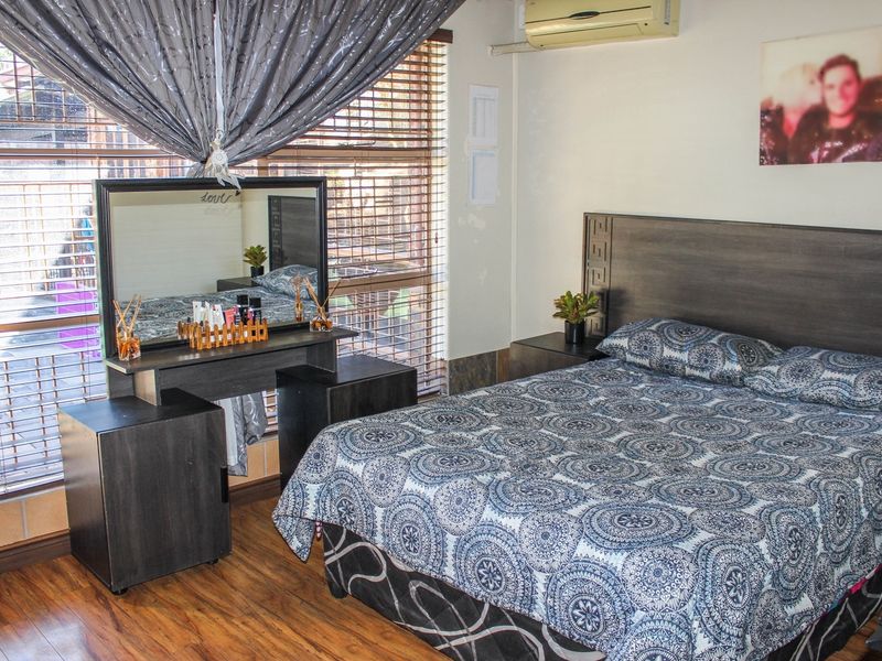 Move-In Ready Family Gem with Pool, Security & Space Galore! - Photo 6