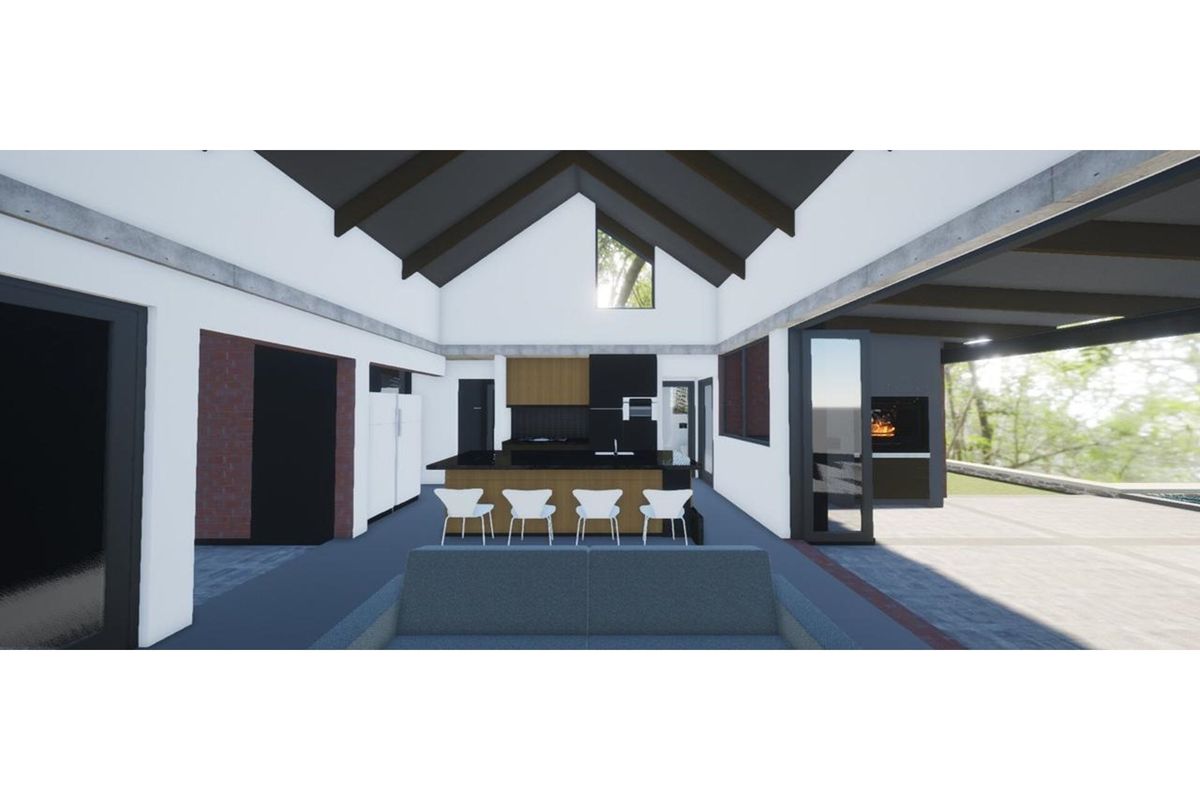 A modern open-plan living and kitchen area featuring vaulted ceilings, exposed beams, and seamless indoor-outdoor flow to a covered patio with a built-in fireplace.