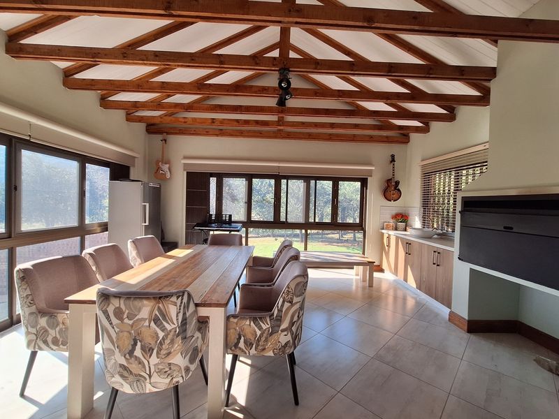 A BUSHVELD MASTERPIECE WITH UNMATCHED FLOW, LUXURY & LOCATION - KRANSPOORT GOLF ESTATE - Photo 5