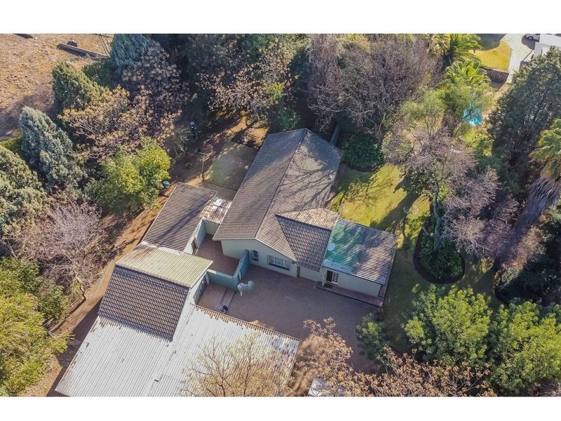 Expansive 2.2 Hectare Property with Two Distinctive Homes and Amenities - Photo 2