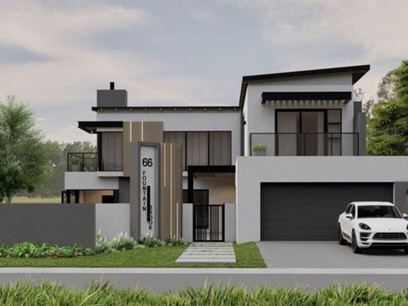 A modern double-story residential property featuring a sleek facade, integrated double garage, and a private balcony.