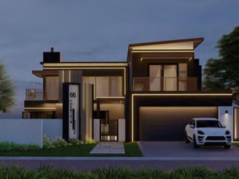 A modern double-story residential facade featuring contemporary architectural design, integrated LED lighting, a double garage, and a balcony at dusk.