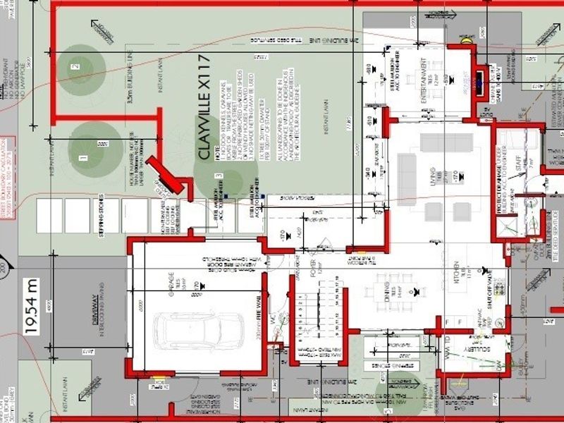 Architectural floor plan detailing the layout of the house, including living areas, kitchen, garage, and outdoor spaces.