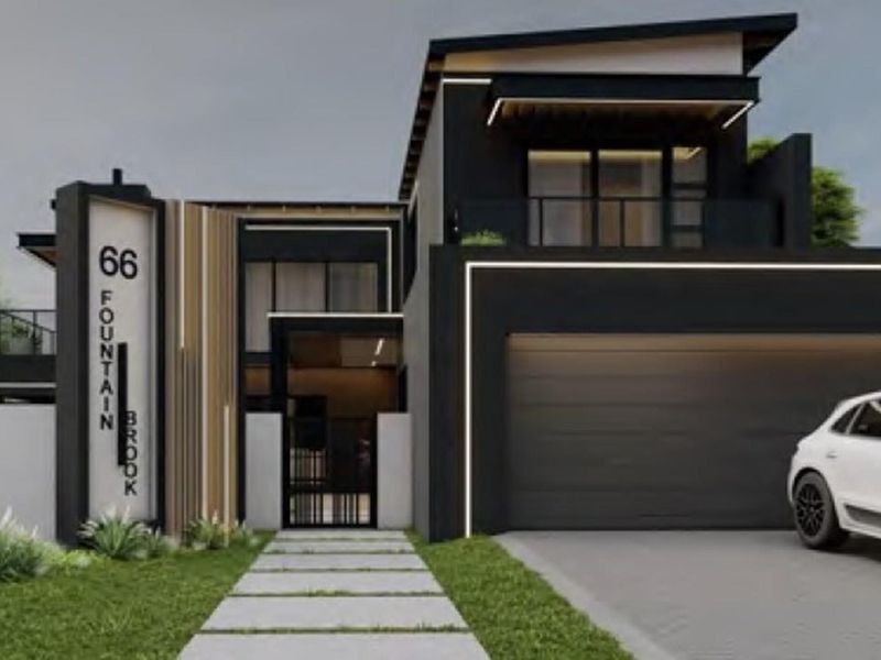 A modern, architecturally designed front facade featuring a double garage, integrated LED lighting, and a clean, contemporary aesthetic.