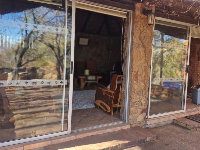 OUTDOORS ENTERTAINMENT AREA - 3 BEDROOM HOUSE - Photo 10