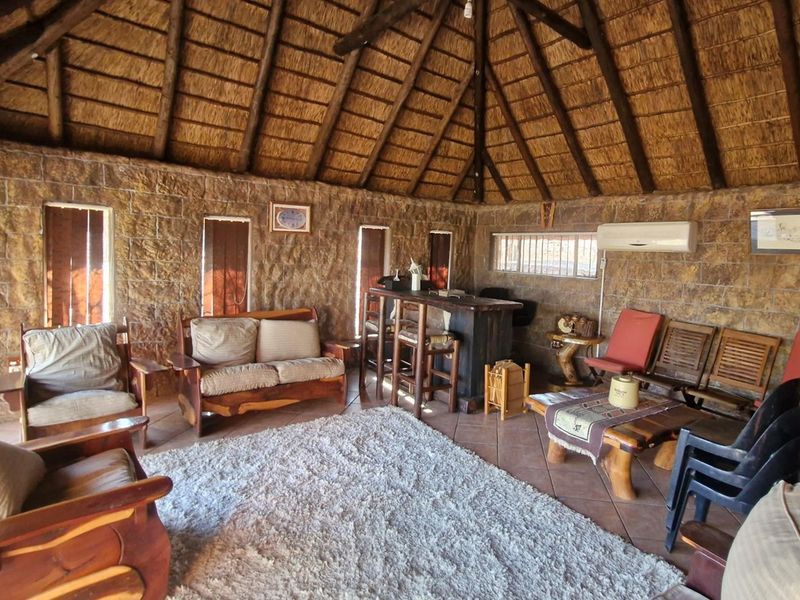 OUTDOORS ENTERTAINMENT AREA - 3 BEDROOM HOUSE - Photo 9