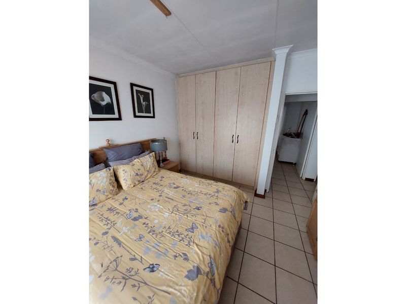 Charming Two-Bedroom Townhouse in Established Area - Photo 10