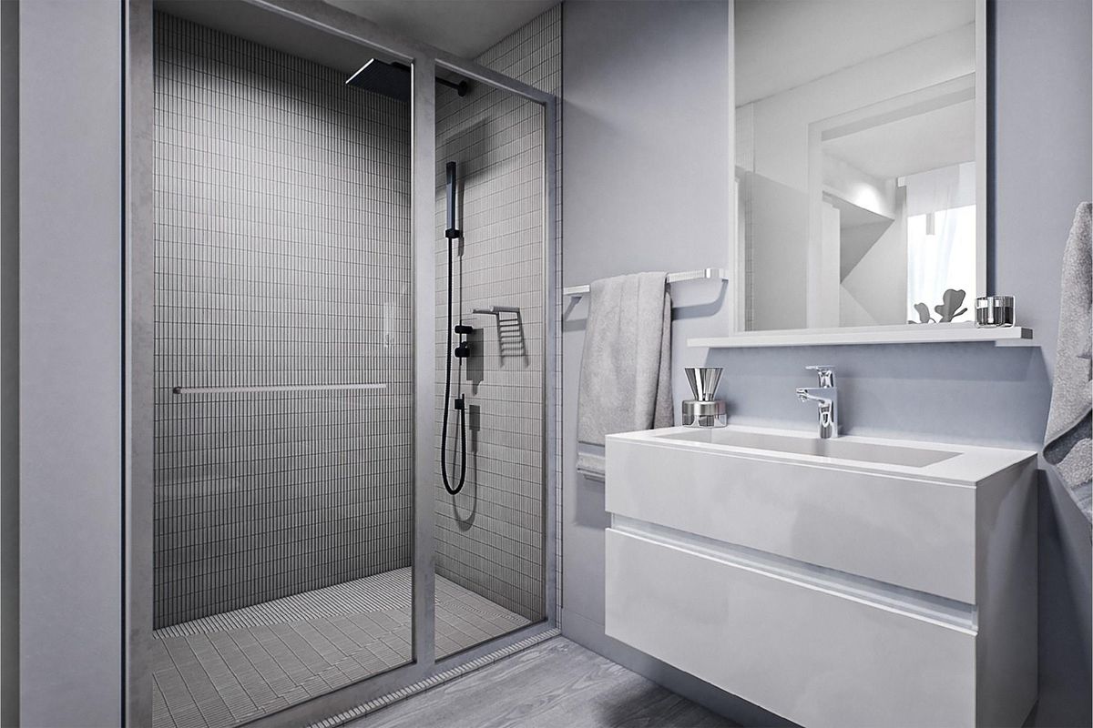 Modern bathroom featuring a walk-in shower with mosaic tiling, a wall-mounted vanity with integrated basin, and a large mirror.