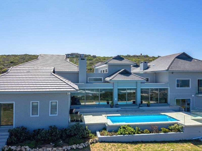 Luxury Coastal Investment Opportunity with Breathtaking White-Water Ocean Views! - Photo 3