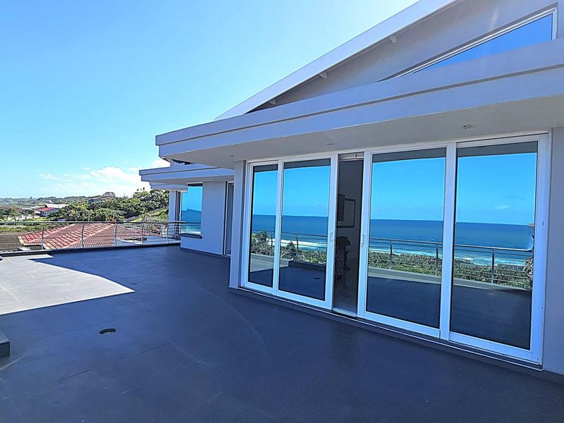 Luxury Coastal Living - Spectacular 5-Bedroom Designer Home - Photo 8