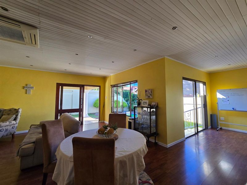 Elevated Family Living with Poolside Entertainment and Energy-Smart Features - Photo 8