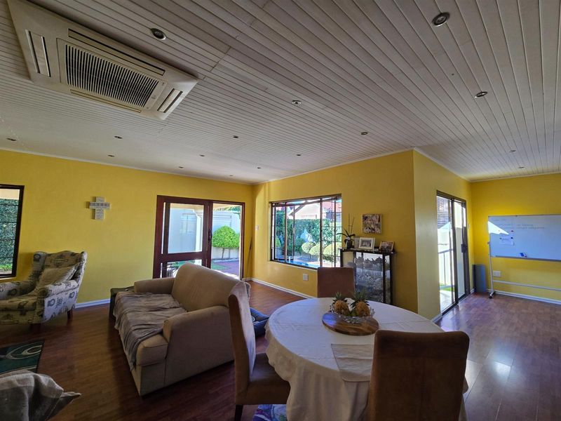 Elevated Family Living with Poolside Entertainment and Energy-Smart Features - Photo 6