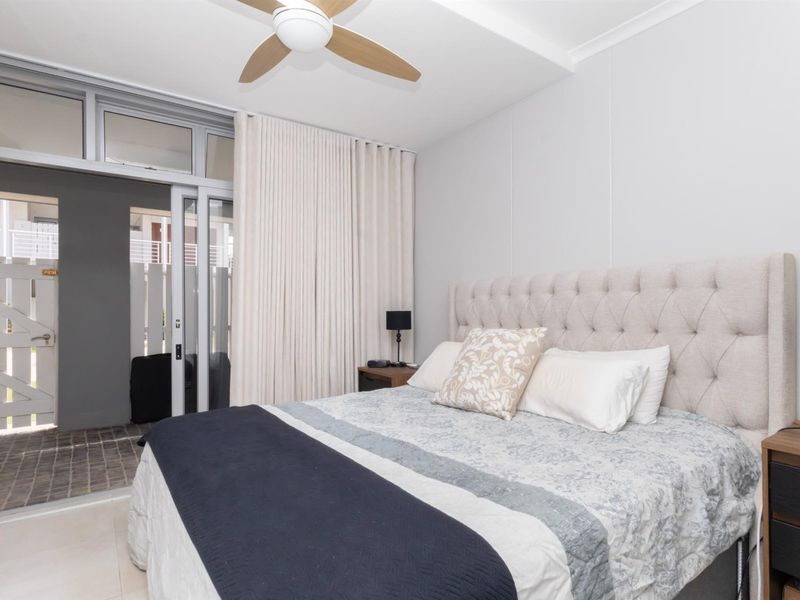 Secure and Modern 1-Bedroom Apartment in the Heart of Big Bay - Photo 3