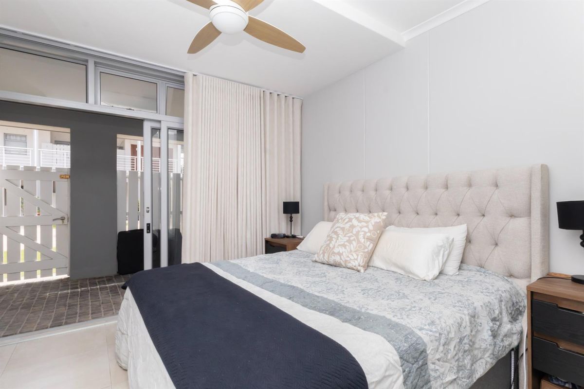 Secure and Modern 1-Bedroom Apartment in the Heart of Big Bay - Photo 3