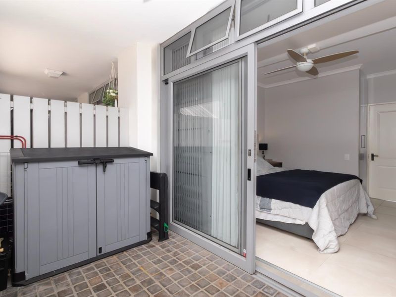 Secure and Modern 1-Bedroom Apartment in the Heart of Big Bay - Photo 5