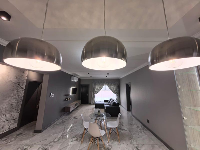 Turn-Key Luxury: Your Sophisticated Sanctuary Steps away from Gariep Hospital - Photo 4