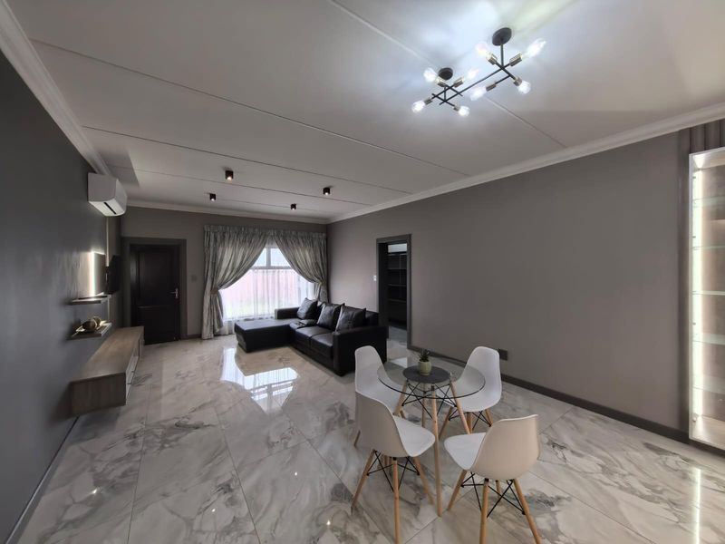 Turn-Key Luxury: Your Sophisticated Sanctuary Steps away from Gariep Hospital - Photo 3