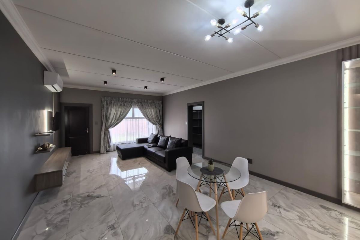 Turn-Key Luxury: Your Sophisticated Sanctuary Steps away from Gariep Hospital - Photo 3