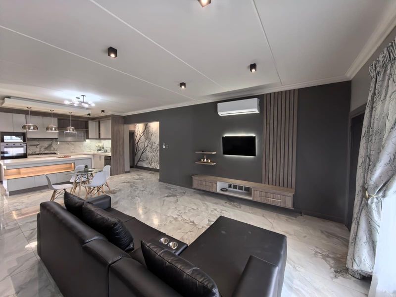 Turn-Key Luxury: Your Sophisticated Sanctuary Steps away from Gariep Hospital - Photo 2