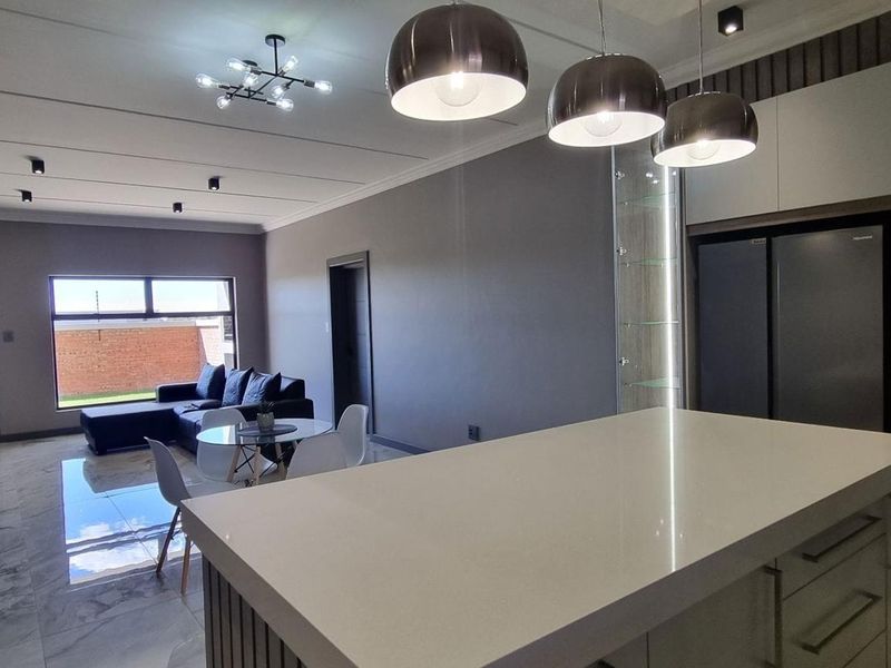 Turn-Key Luxury: Your Sophisticated Sanctuary Steps away from Gariep Hospital - Photo 5