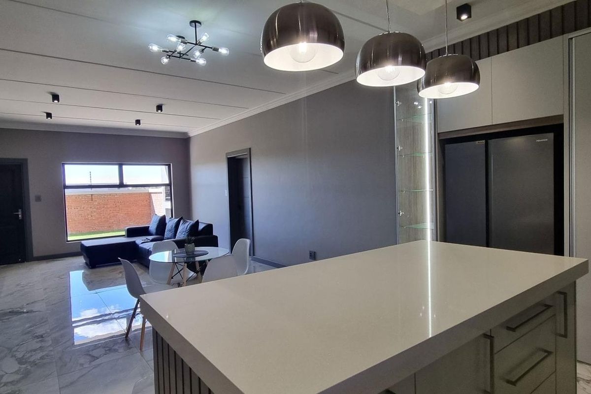 Turn-Key Luxury: Your Sophisticated Sanctuary Steps away from Gariep Hospital - Photo 5
